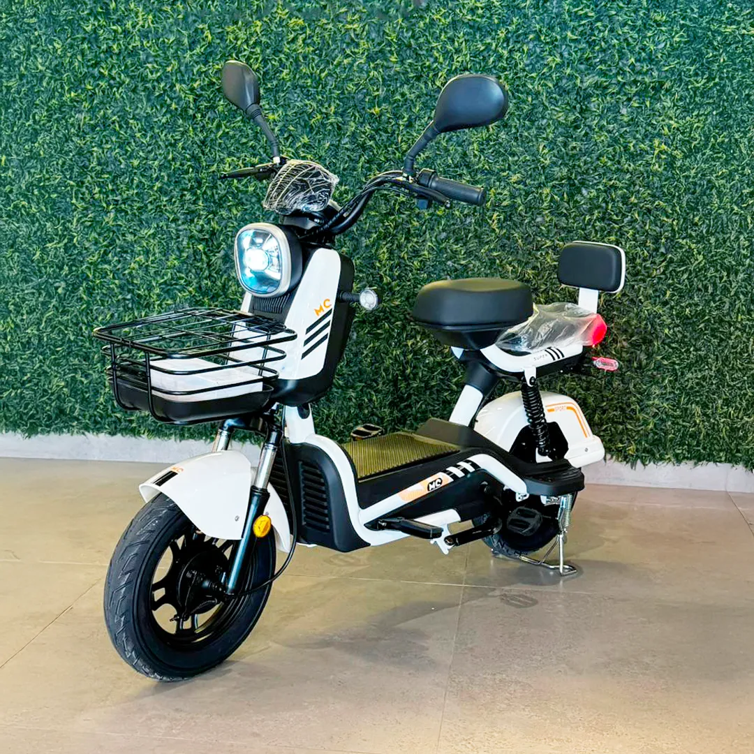 Person on scooter near cafe